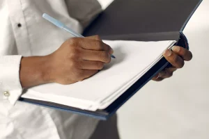 An image of a person taking a record of achievement